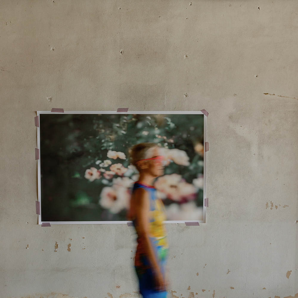 AWB Blurred walking in front of print