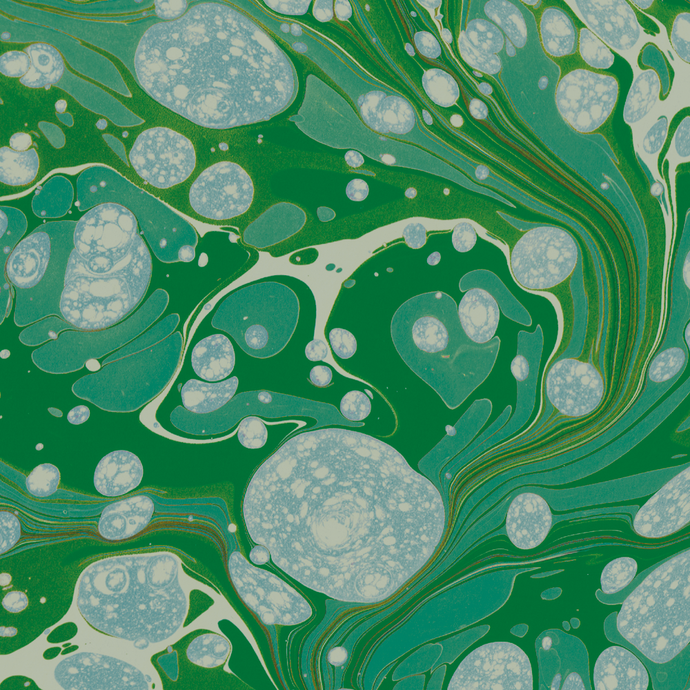 6x6" close up of Milano Gemma wallpaper by Ashley Woodson Bailey, an ornate marble in emerald and seafoam, like light coming through green glass.